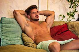 Shirtless Male Model Lying Alone On