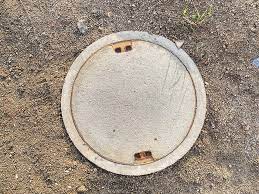 Manhole With The Concrete Cover On