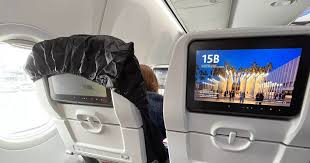 Covered Plane Seat With Plastic Sheet