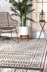 51 Outdoor Rugs To Make Your Patio Feel
