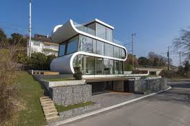 10 Eye Catching Glass House Design To