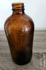 Amber Colored Glass Bottle With Letters