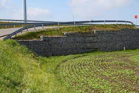 A Concrete Retaining Wall On A Slope