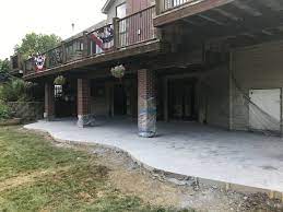 Colored Concrete Patio Under Deck