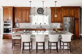 Cherry Cabinets And White Countertops