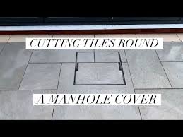 Tiling Over A Manhole Cover Paving