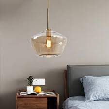 11 8 In W X 10 4 In H 1 Light Amber Glass Champagne Gold Pendant Light With Shade