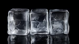 Premium Ai Image Ice Cube On Black Glass
