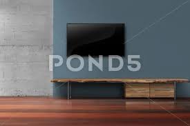 Led Tv On Dark Blue Wall With Wooden