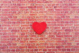 Heart Shape Icon On A Brick Wall