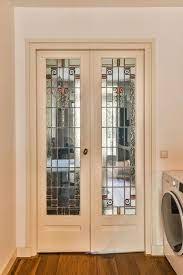 A Laundry Room With Two Doors With