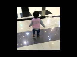 Little Girl Walks Into Glass Door