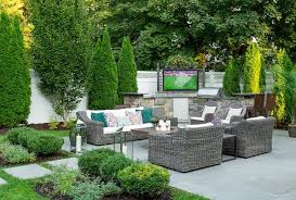 Stoned Tiled Outdoor Kitchen With Tv
