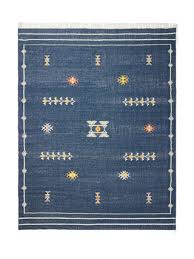 16 Best Outdoor Rugs That Ground Any