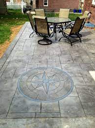 Stamped Concrete Patio With Compass Design