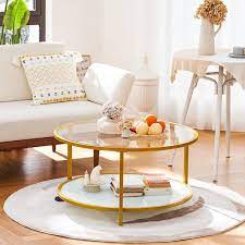 Merra 34 In Gold Round Tempered Glass Coffee Table With Low Storage Shelf