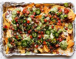 fully loaded black bean nachos with red