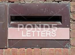 Old British Postal Mail Box In A Brick
