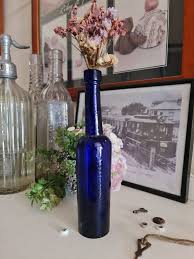 Antique Blue Tall Bottle With Crooked