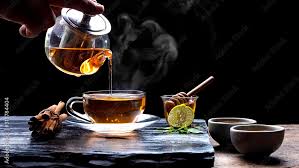 Pouring Hot Aromatic Herbal Tea From