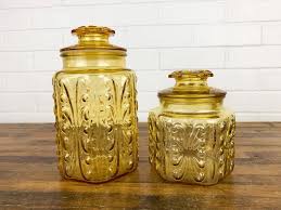 Set Of 2 Amber Glass Jars With Lids