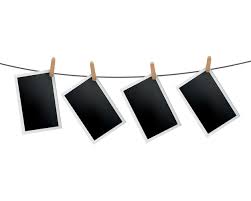 Photo Frames Hanged On Rope Retro