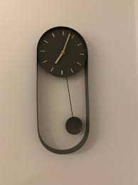 John Lewis Pendulum Metal Ogue Wall