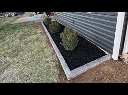 Lay Brick Edging Around A Landscape Bed