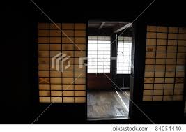 An Old Yellowish Shoji Door In An Old