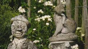 Weathered Garden Statue Of Man With Hat