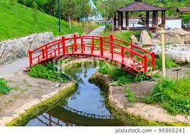 Gazebo By A Pond In Japanese Garden