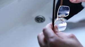 Man Cleaning Glasses Stock Footage