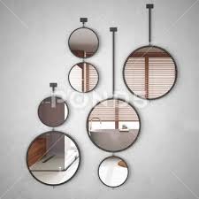 Round Mirrors Hanging On The Wall