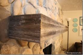 wood mantel on a masonry fireplace