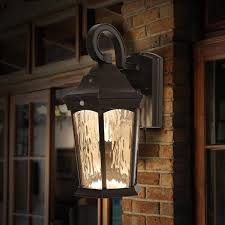 Home Decorators Collection 15 9 In Bronze Integrated Led Outdoor Wall Lantern Sconce With Flickering Bulb Motion Sensor And Photocell Fl 382hd