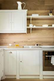 Wood Walls In A Cozy White Kitchen