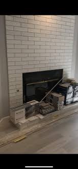 Mount A Tv On Tile Wall Above Fireplace