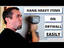 How To Hang Heavy Items On Drywall