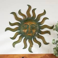 Litton Lane Metal Copper Sun Wall Decor With Smiling Face And Curved Rays Brown