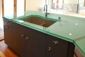 75 Green Kitchen With Glass Countertops