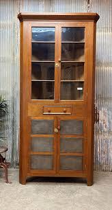 Primitive Glass Front Corner Cabinet