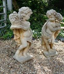 Weathered Classical Statues Of Children