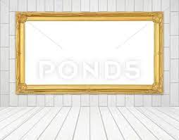 Golden Frame In Room With White Wood