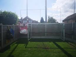 Mum Puts Up Huge Net To Stop Footballs