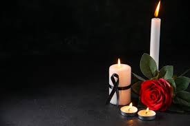Burning Candle With Red Flower