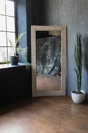 Stylish Mirror On A Gray Wall Background