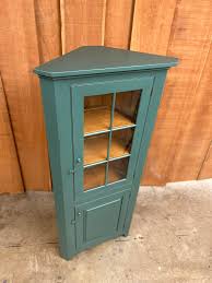 Blue Over Red Glass Door Corner Cabinet