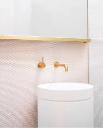 Blush Pink Tiles Paired With Brass