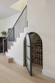 Wine Cellar Boasts Arched Glass Doors