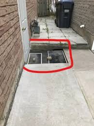 Storm Drain Outside Of Basement Door